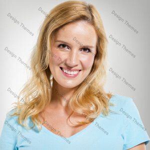 A woman with blonde hair and blue shirt smiling.